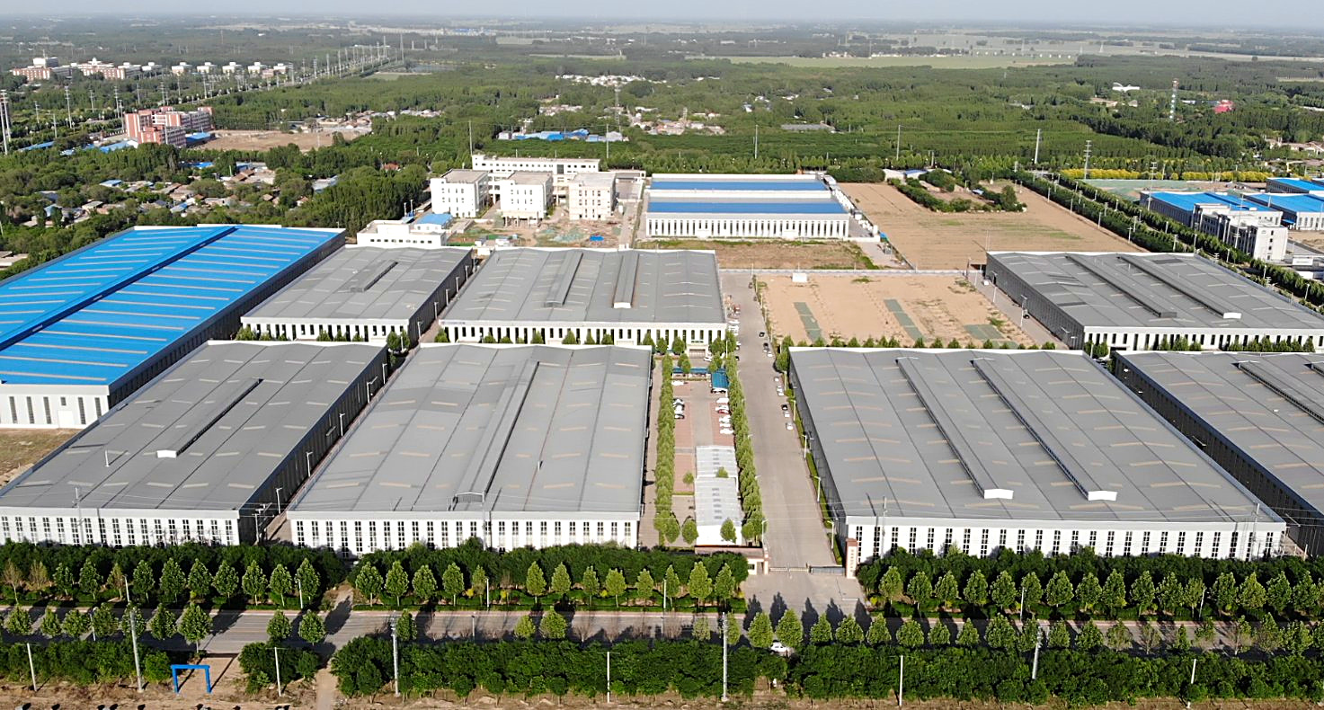 Aerial view of the Shengmei production campus — production halls and assembly yard in Xiong'an New Area, Hebei